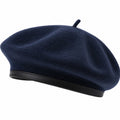 Béret bleu marine avec bordure en cuir